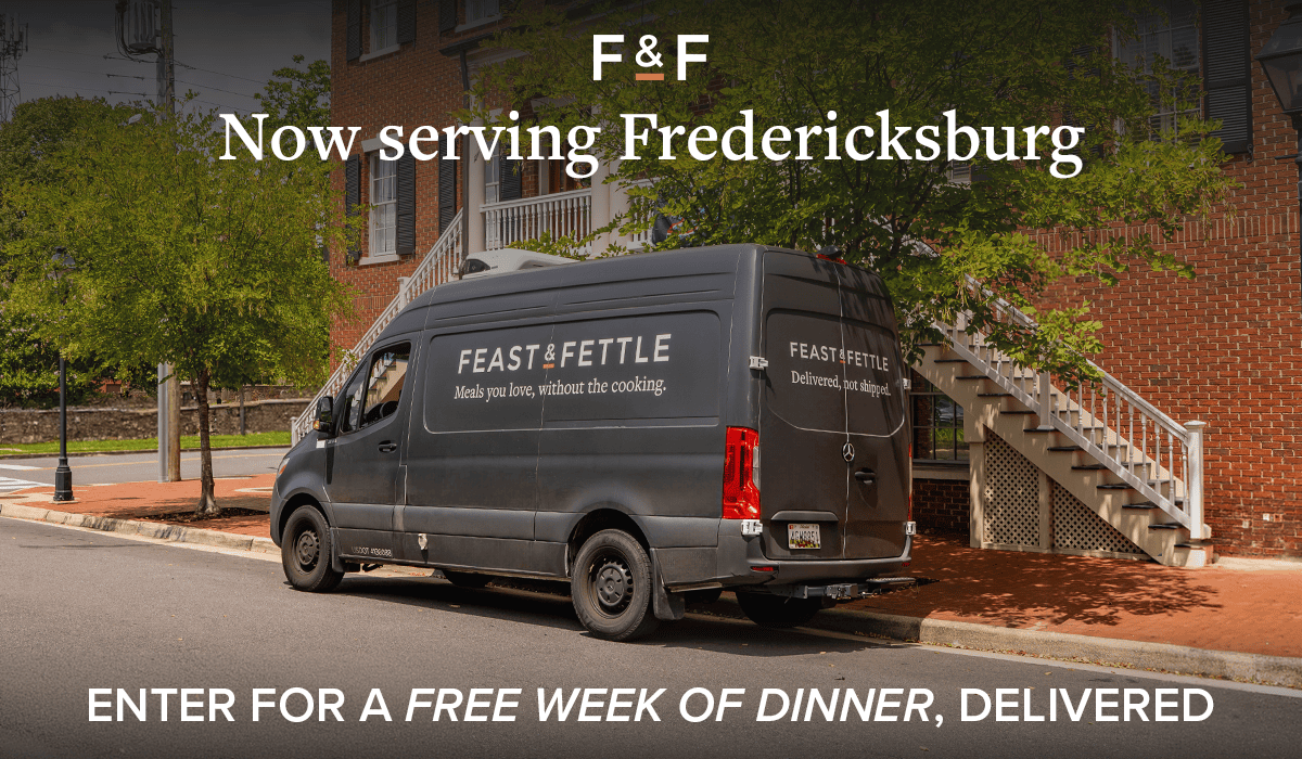Feast & Fettle delivery van parked on a street with the text Now serving Fredericksburg overlaid above.