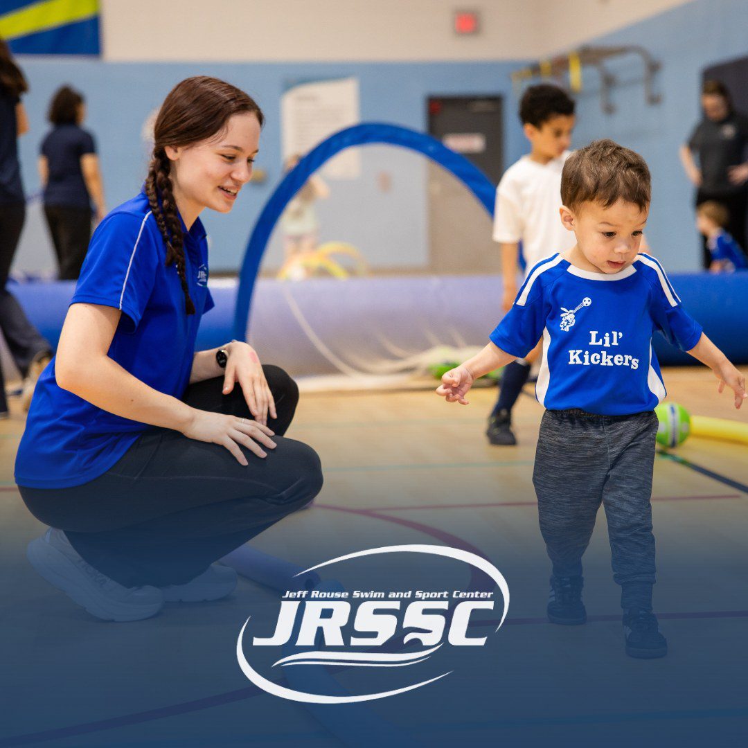 Jeff Rouse Swim and Sport Center ad: a coach and toddler at Lil Kickers soccer